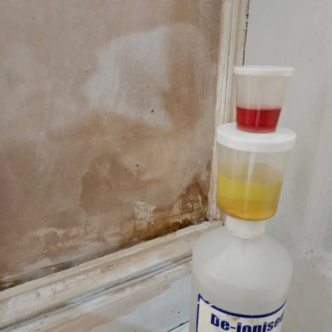 Salts testing: Liquids in cups on a bottle, used to detect leaks in concrete/masonry walls.